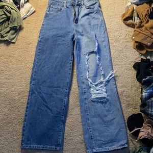 Half of leg is light blue other half is dark blue